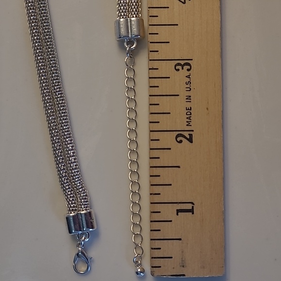 Serpentine bi-strand silver-tone necklace w/ silver-tone ring pendants - Picture 7 of 10